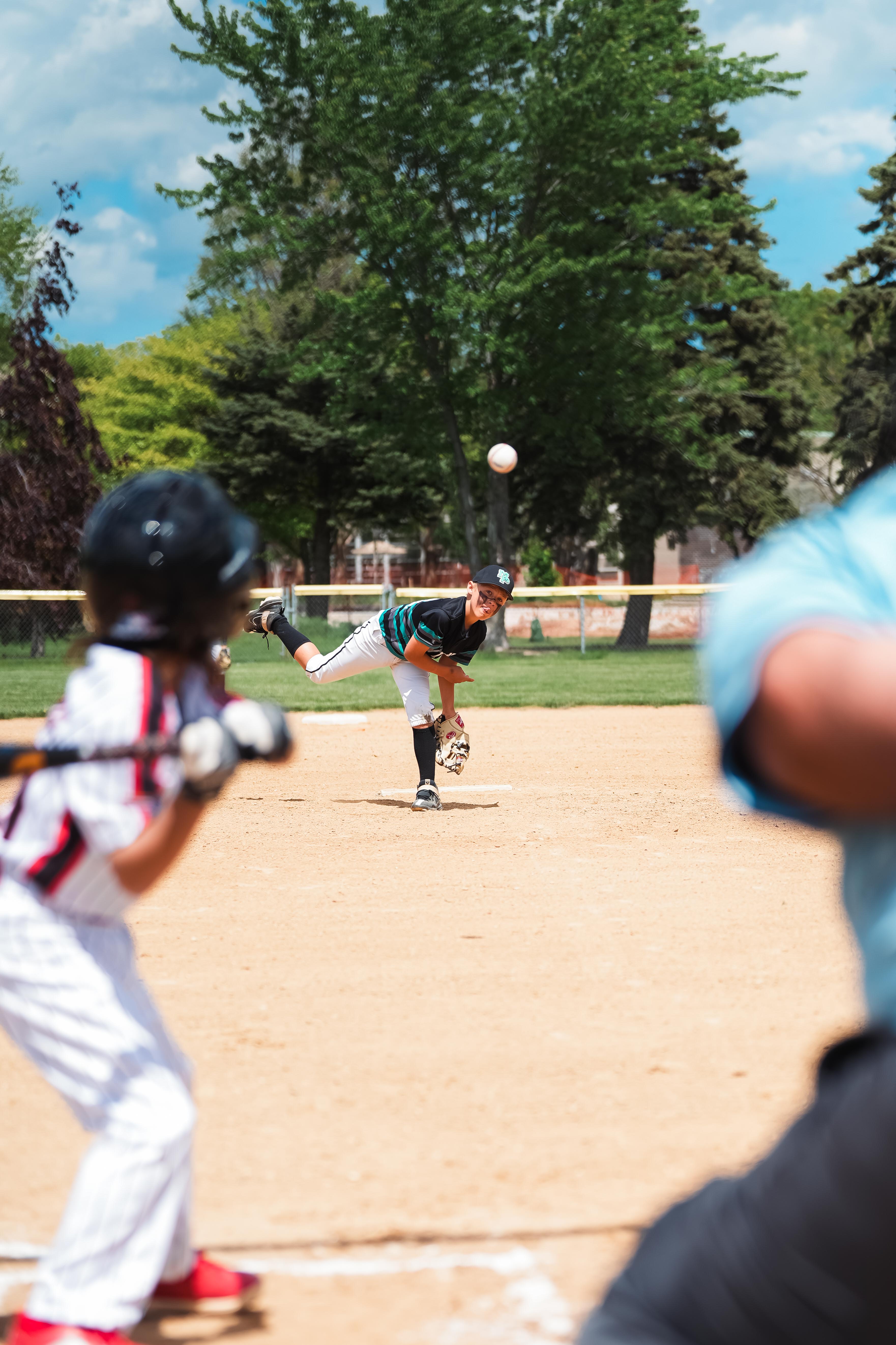 Mavericks pitcher mid-throw