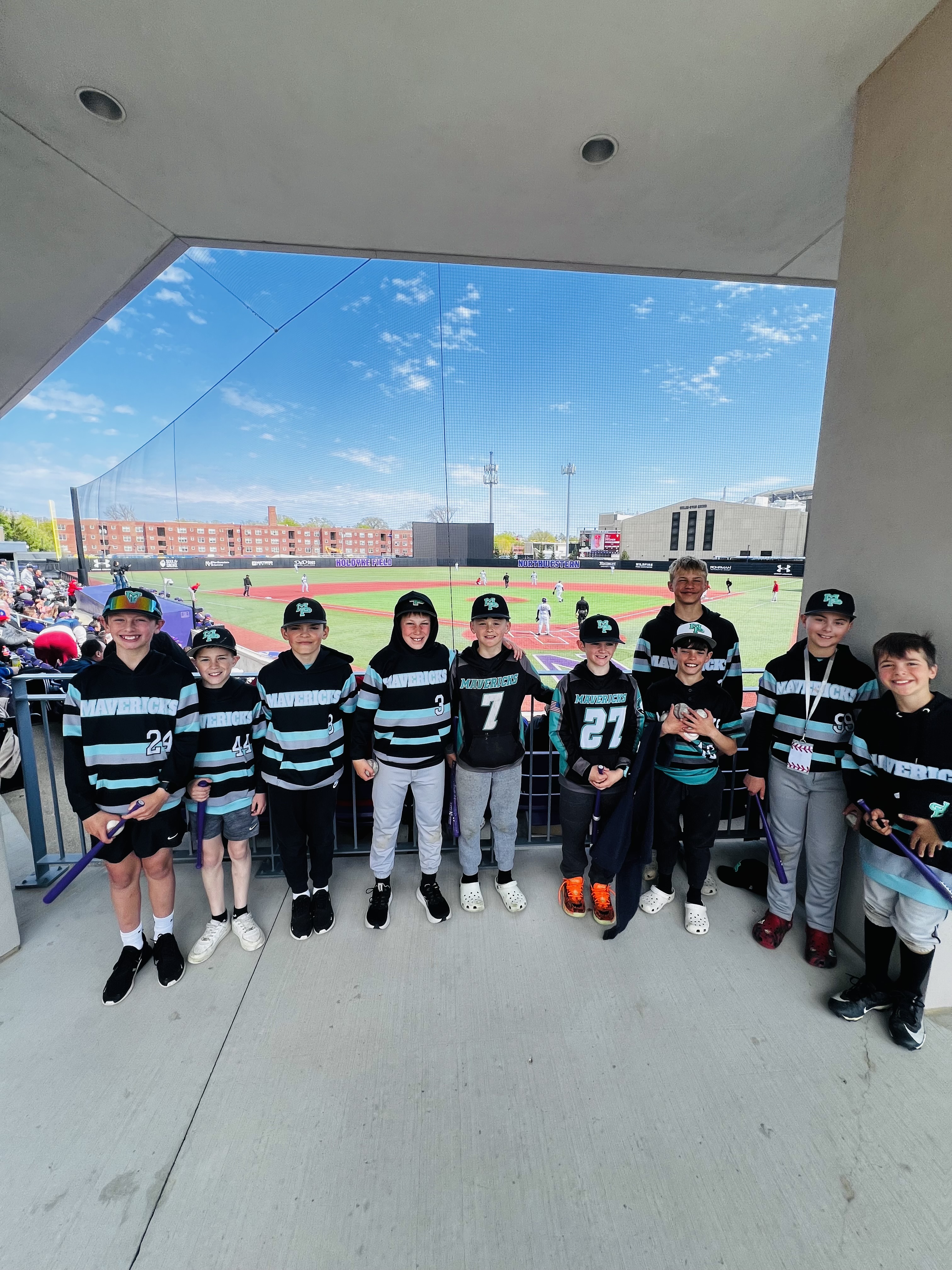 Mavericks team at a college baseball stadium