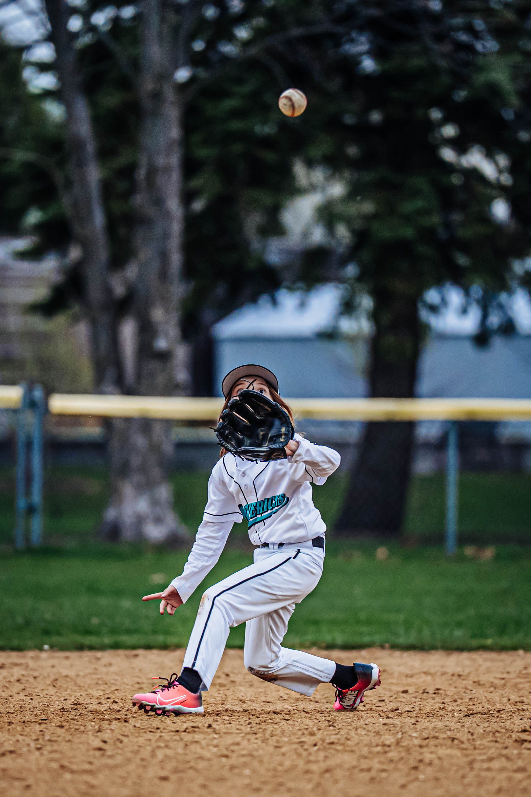 Mavs fielder catching a fly ball