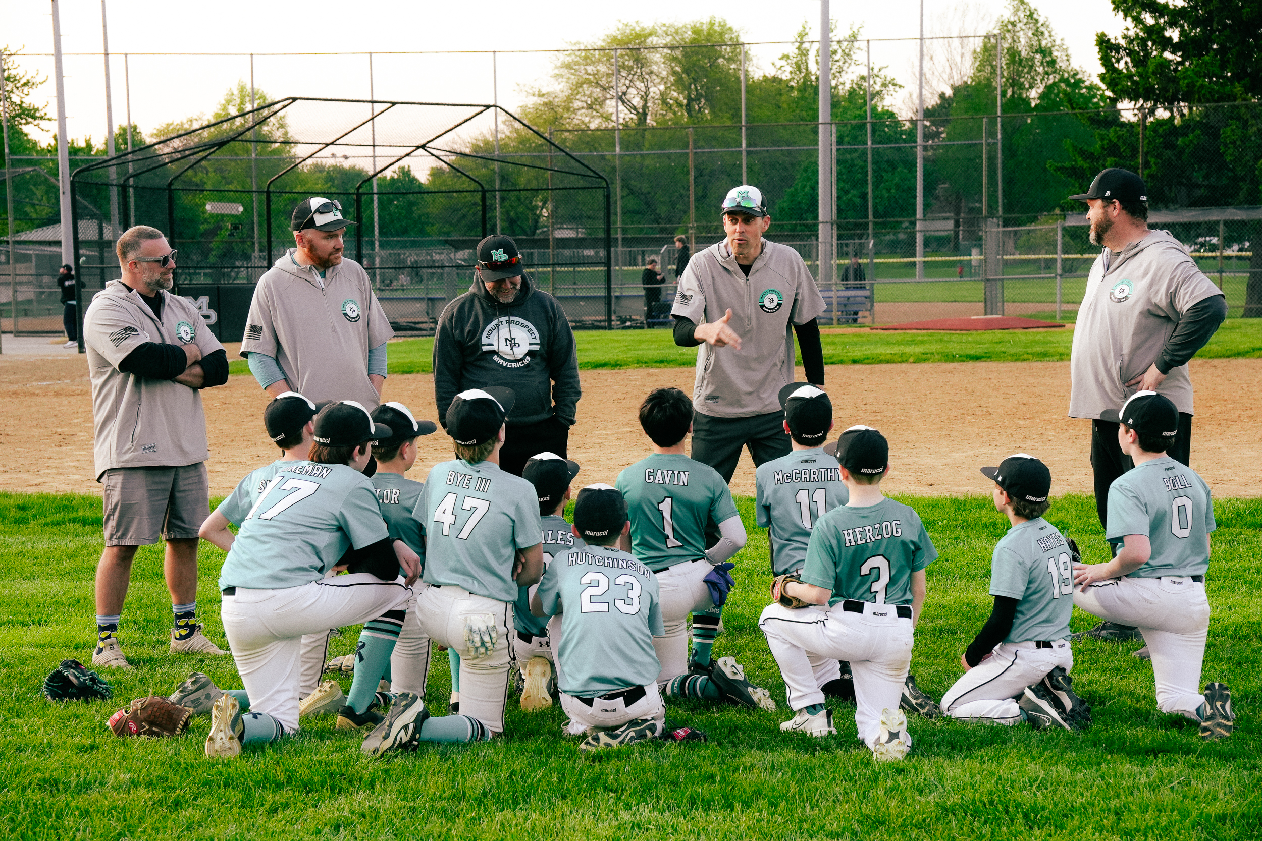 Team huddle with coaches